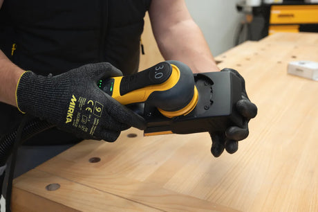 Mirka DEOS 81 x 133mm Edge Protector being put on