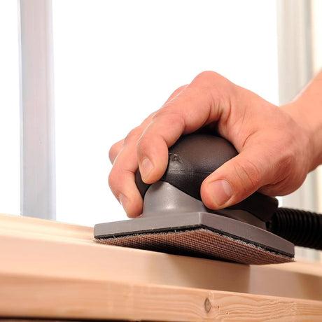Mirka Abranet 70 x 125mm Sanding Strips in use on sanding block with extraction