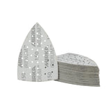 A stack of triangular DEOS Delta abrasive pads with multi-holes for extraction with one disc standing upright in front. The discs are light gray with dark gray printed text reading 'MIRKA IRIDIUM 150'. On clean white background.